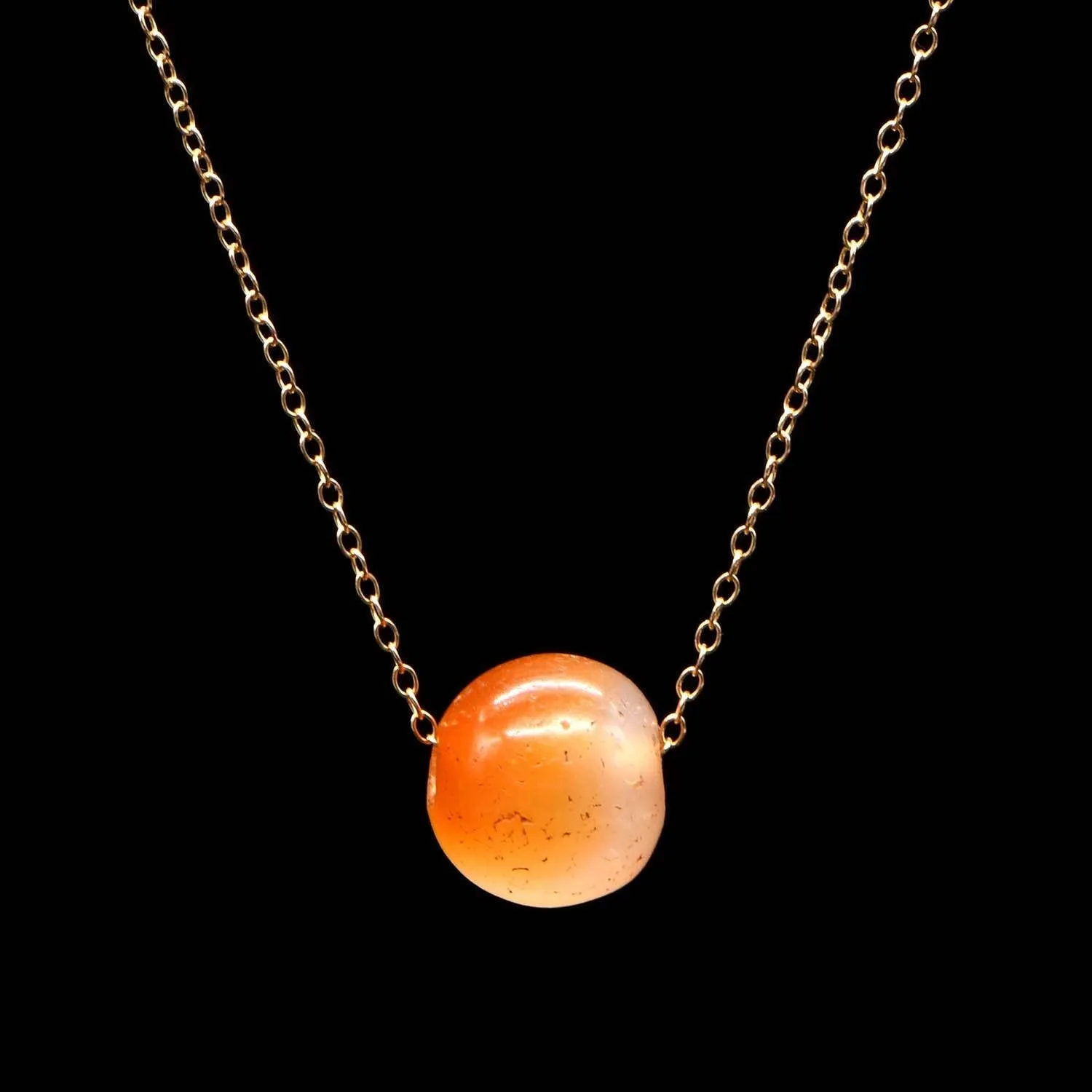 An Egyptian Carnelian Bead set as a pendant, Middle Kingdom, ca. 2017 - 1750 BCE