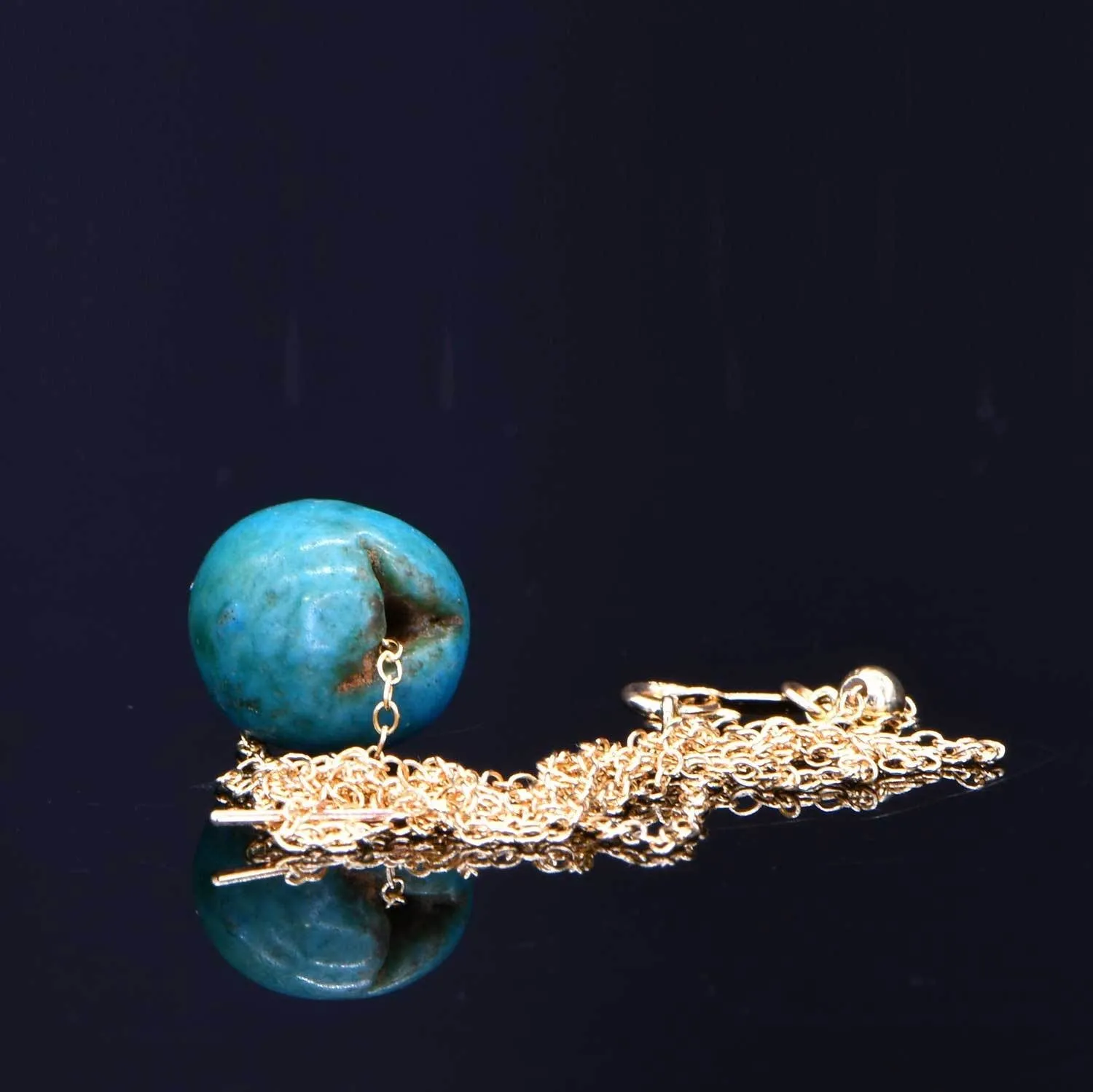 An Egyptian Faience Ball Bead Pendant, Middle Kingdom, ca. 2141 - 2122 BCE