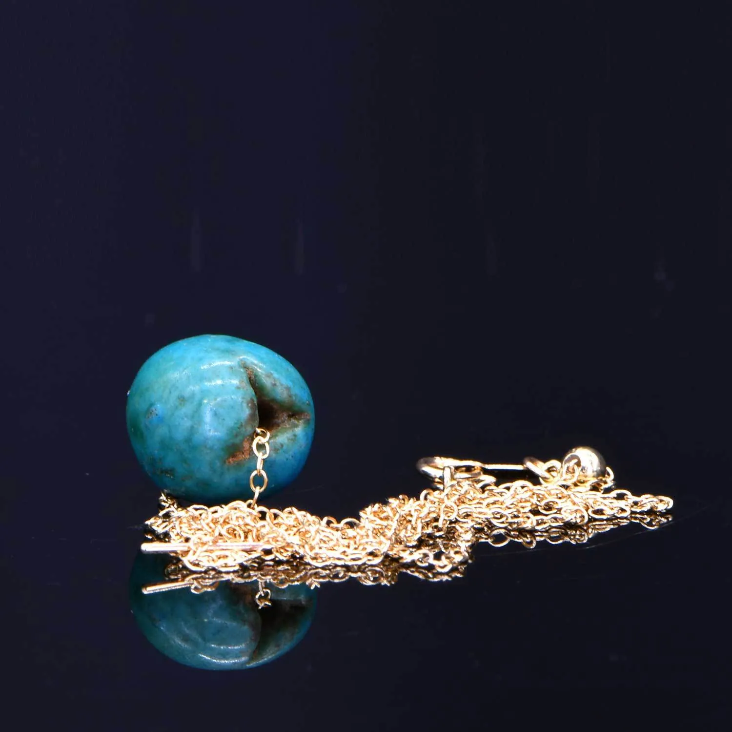 An Egyptian Faience Ball Bead Pendant, Middle Kingdom, ca. 2141 - 2122 BCE
