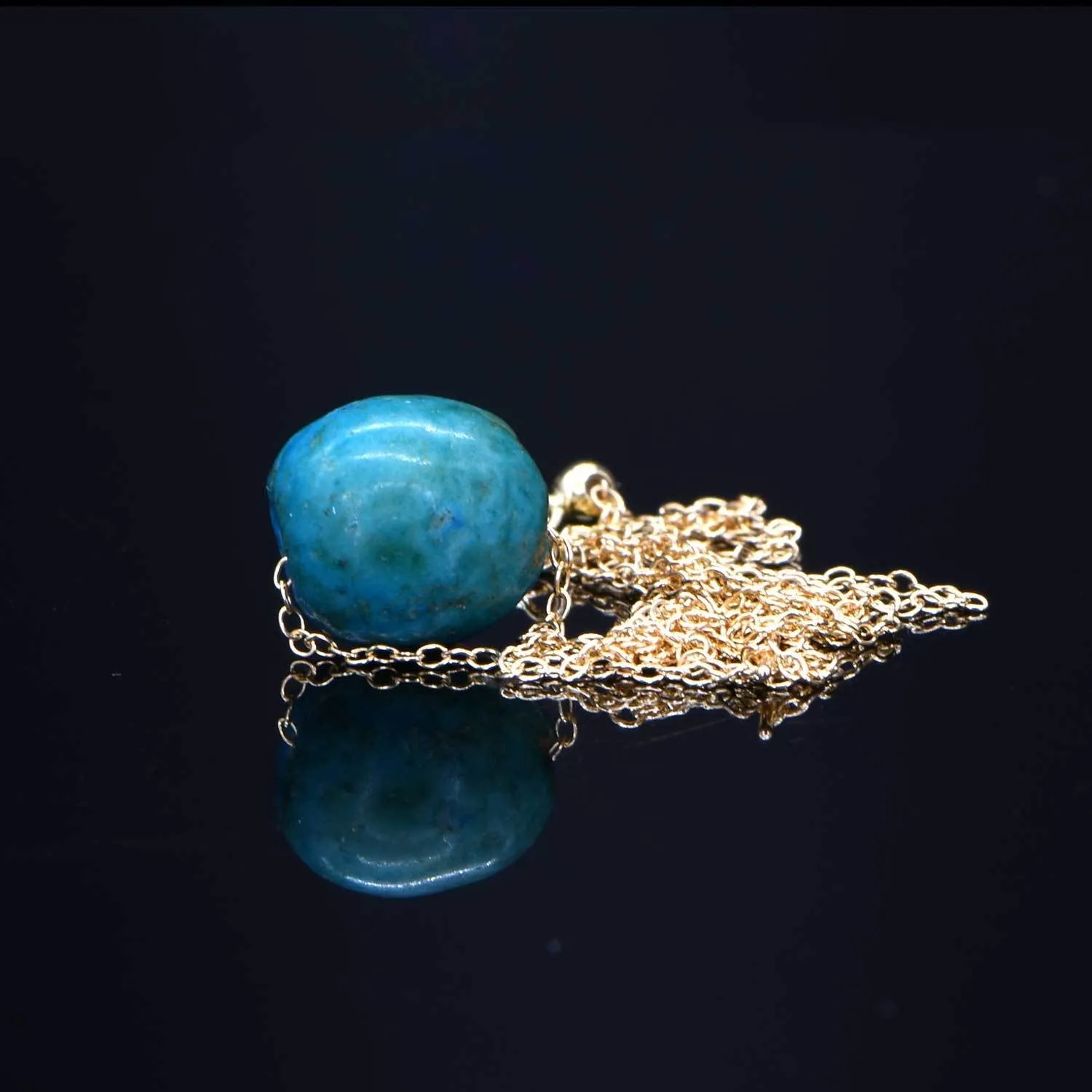 An Egyptian Faience Ball Bead Pendant, Middle Kingdom, ca. 2141 - 2122 BCE