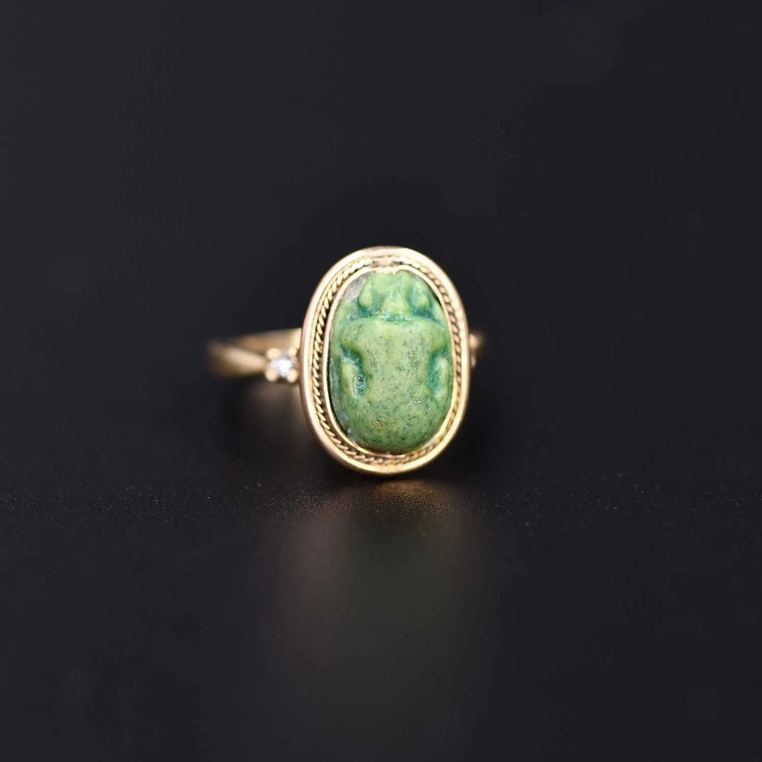 An Egyptian Green Glazed Faience Scarab, Amarna Period, ca. 1353 - 1336 BCE