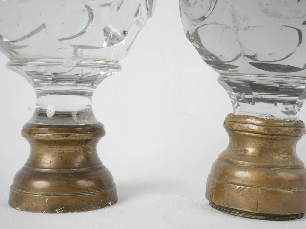 Antique French inexact pair of round clear glass 'Boule d'escalier’ newel caps w/ brass bases 7"