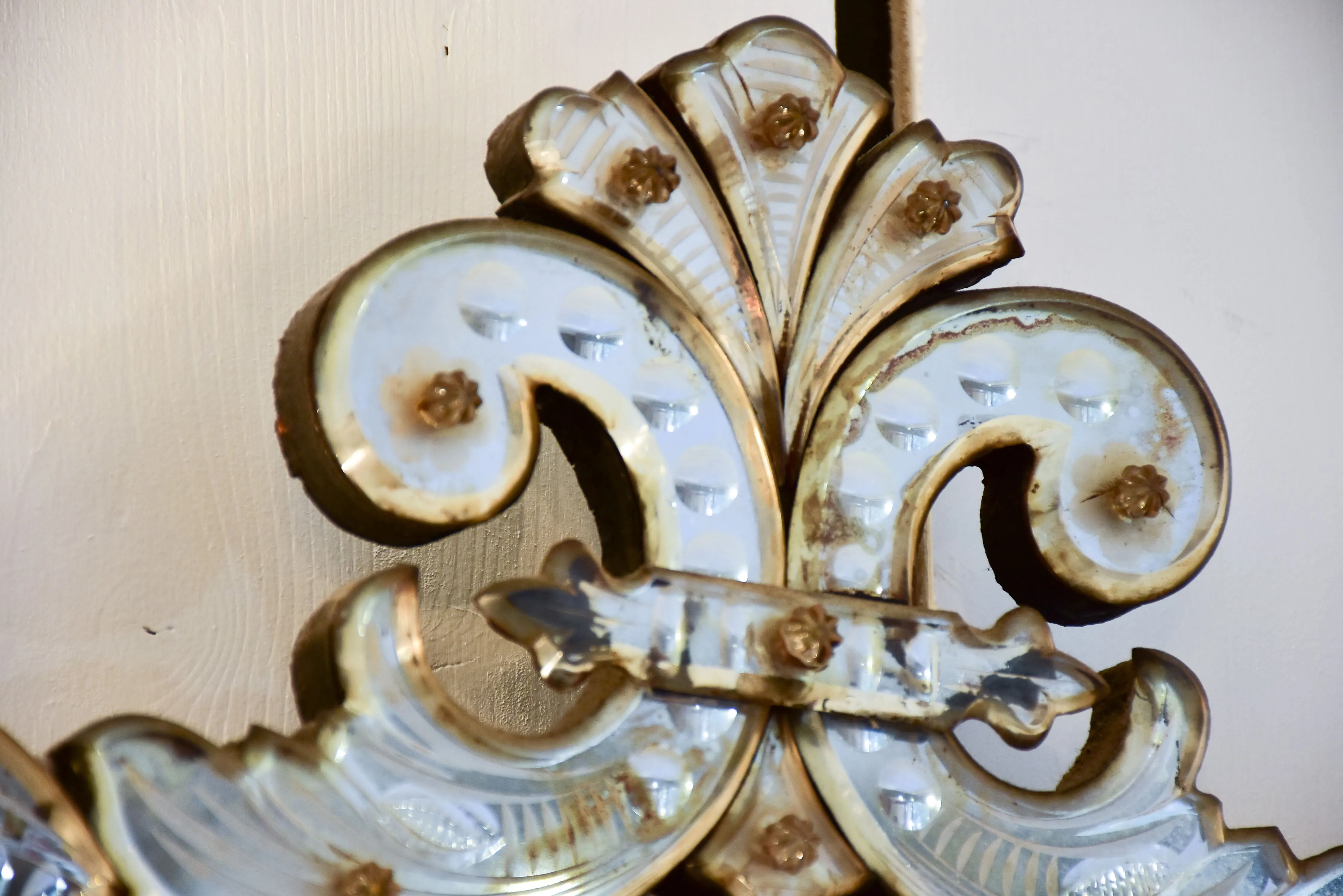 Antique Venetian mirror with decorative frame