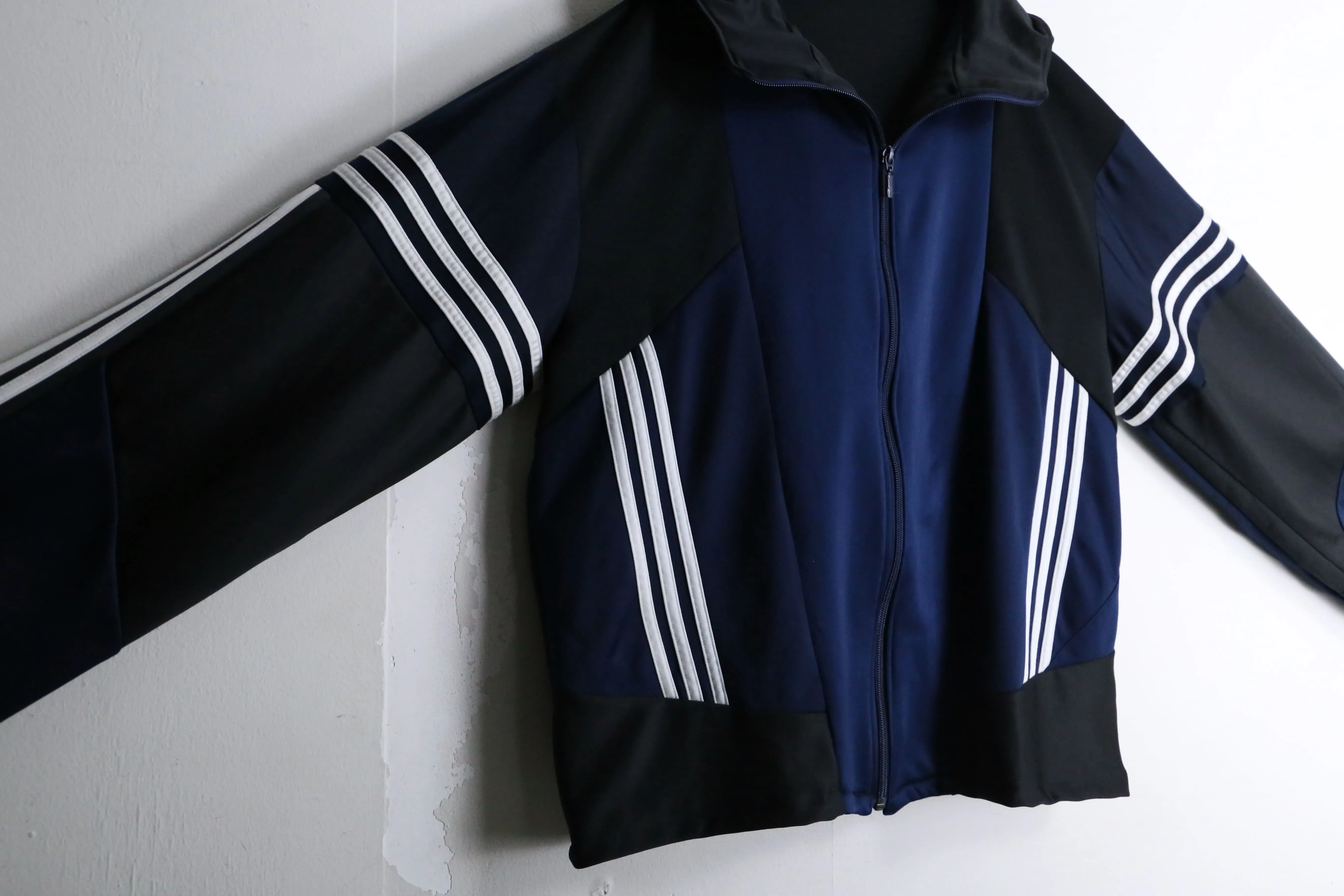 "Re:make" symmetry line hoodie track jacket